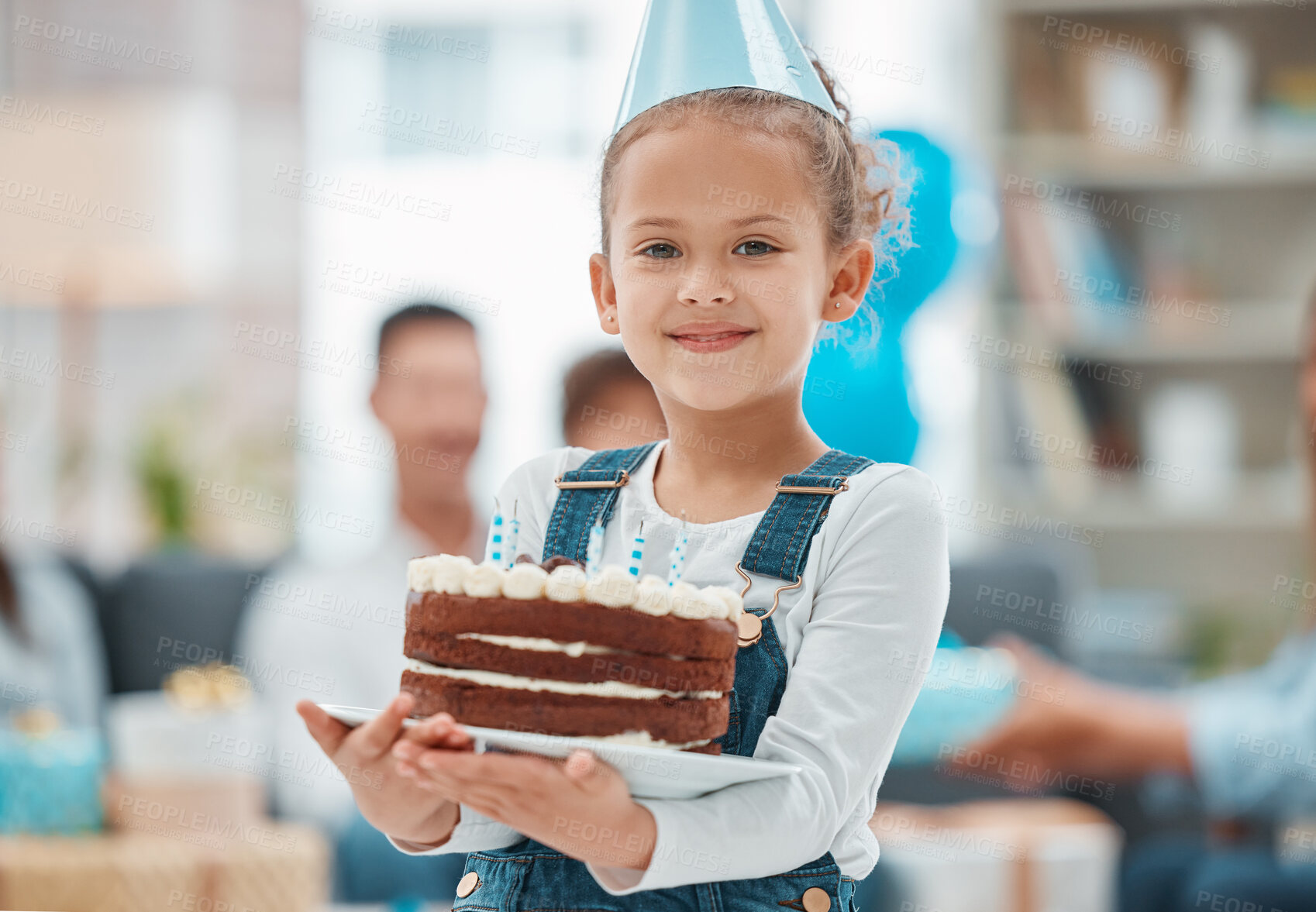 Buy stock photo Birthday, cake and portrait of child in living room for celebration, balloons and milestone event. Gift giving, love and support with girl and party at family home for growth, care and gathering.