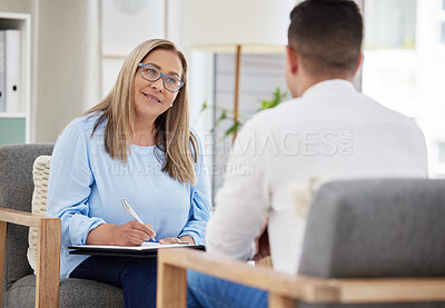 Buy stock photo Woman, psychiatrist and patient during a therapy consultation in her clinic or psychologist consulting or talking to a man in office. Mental health, female therapist and conversation wit appointment