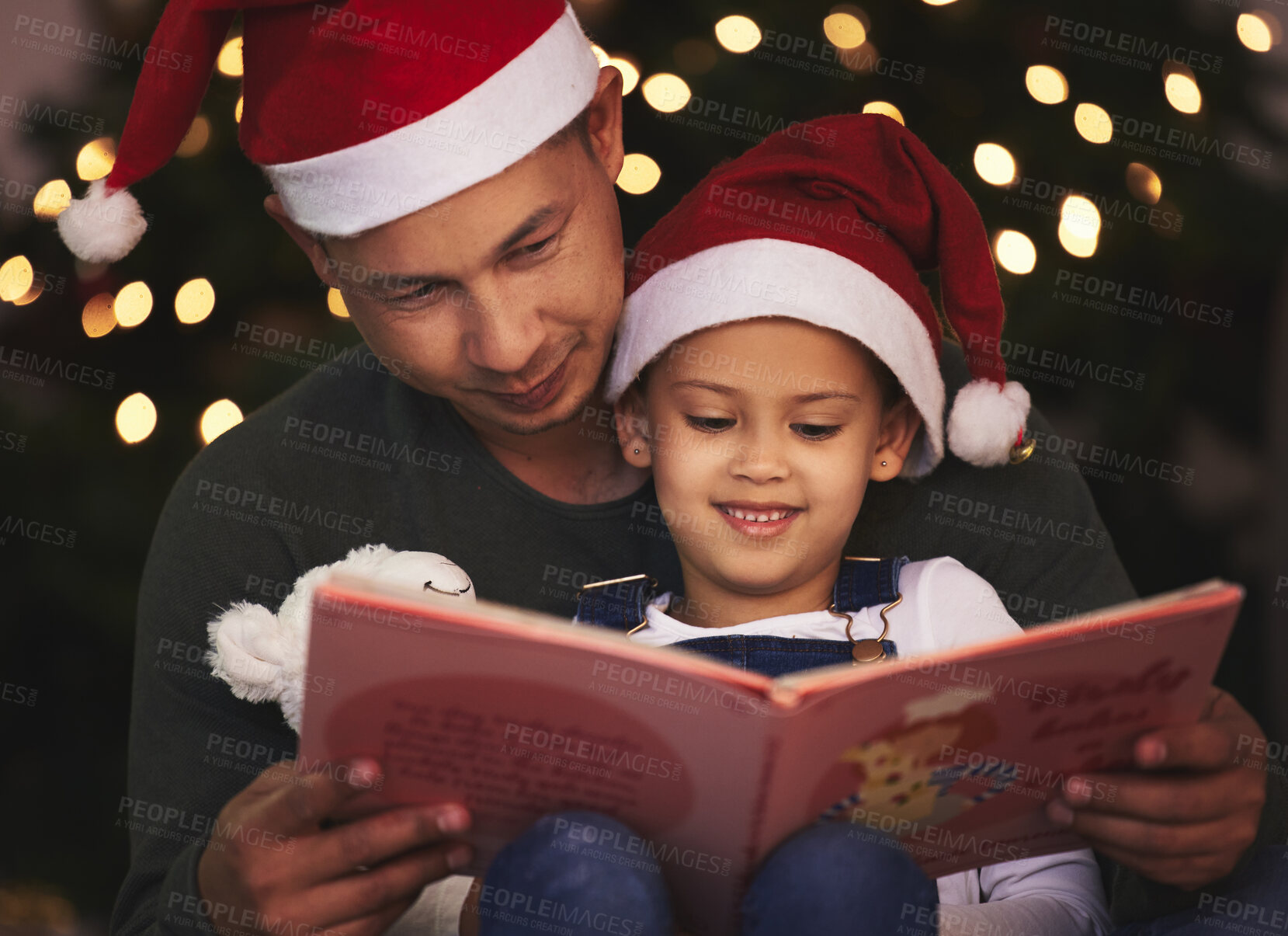 Buy stock photo Christmas, happy and book with father and daughter for festive story, bedtime or xmas celebration. Reading, winter holiday and decorations with people at family home for present, vacation or night