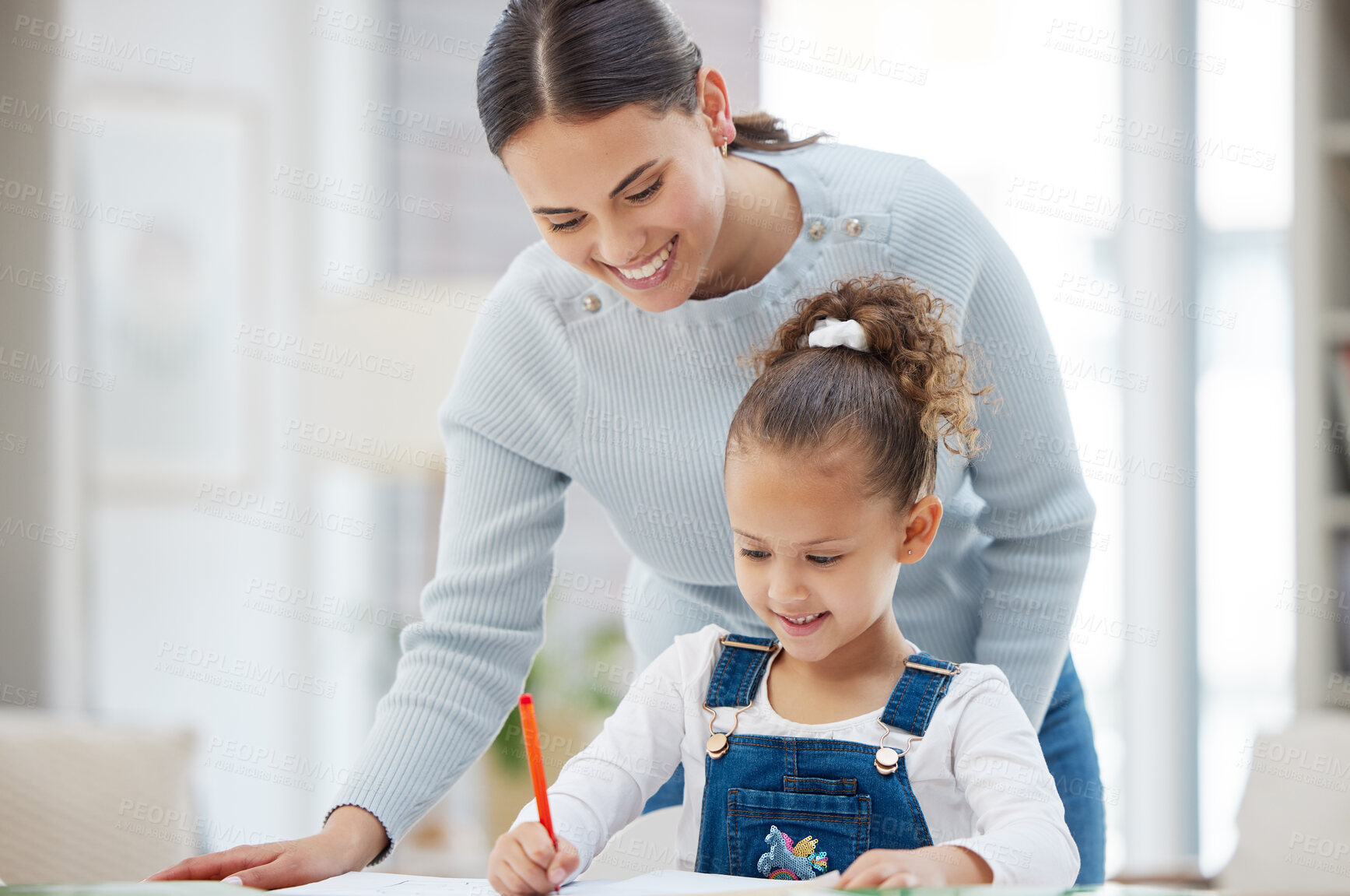 Buy stock photo Woman, kid and happy in home for education, support and helping with homework. Mother, girl and encourage in living room for learning, creative and development with positive reinforcement for growth