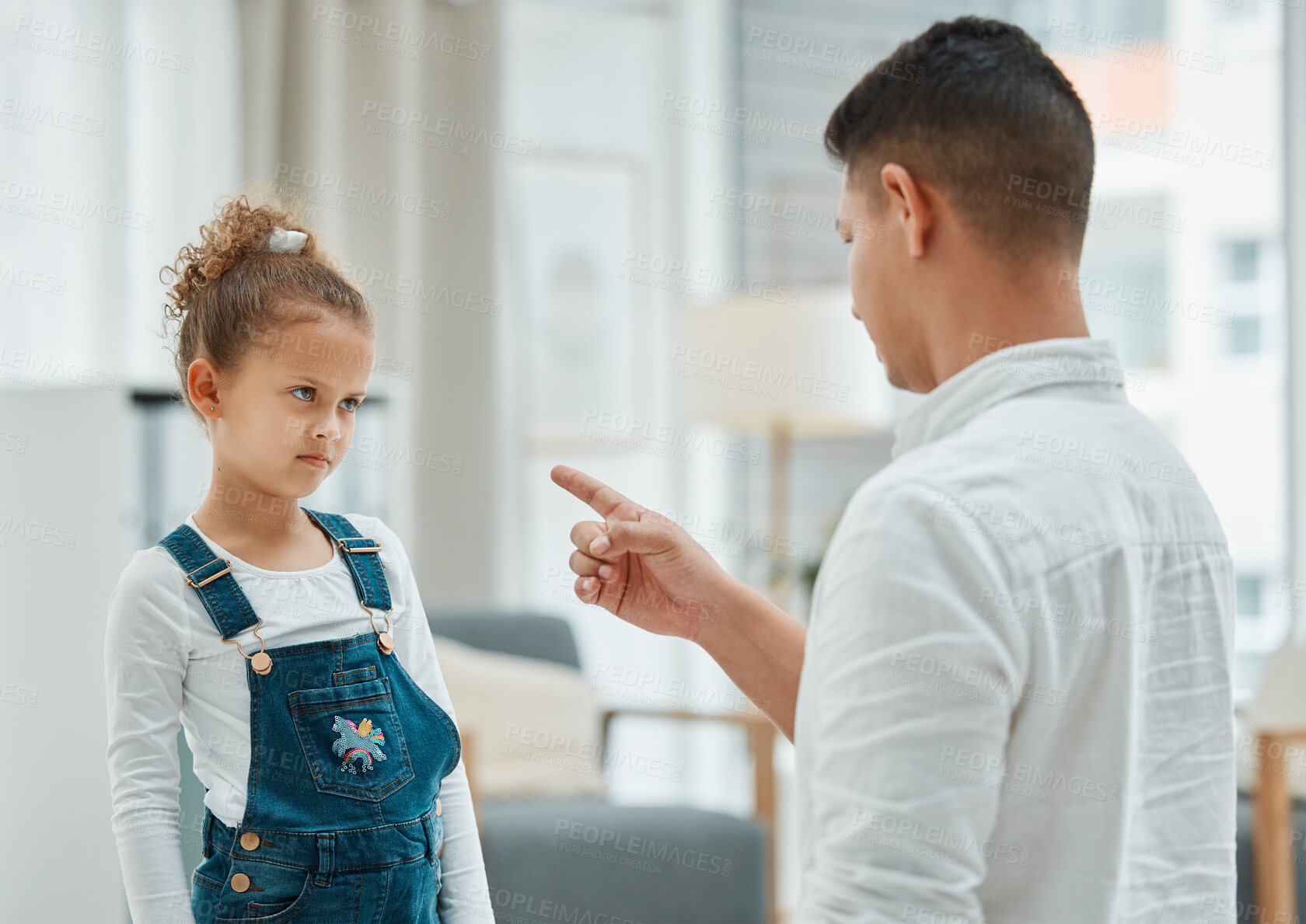 Buy stock photo Child, father and discipline in home with behaviour problem, frustrated and conflict with lecture. Unhappy, fight and living room with youth development lesson with advice and punishment conversation