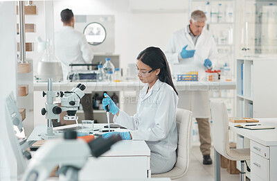 Buy stock photo Woman, pipette and microscope in lab for science, innovation and medical research with liquid sample. Scientist, chemistry and experiment for genes editing breakthrough, microbiome and biotechnology