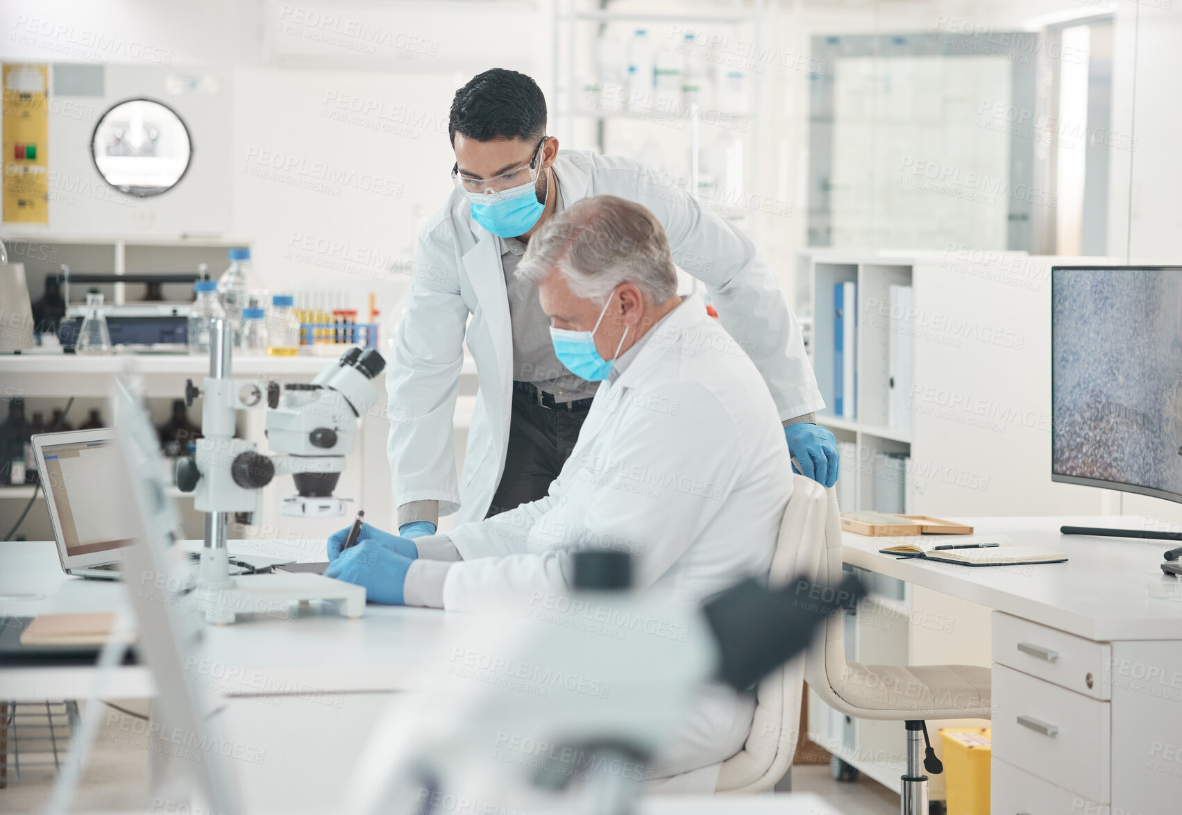 Buy stock photo Writing, scientist and men in lab, collaboration and medical research for MERS, cure and vaccine. Notes, analysis and mature person with mask in clinic, pharmaceutical and report for test and disease