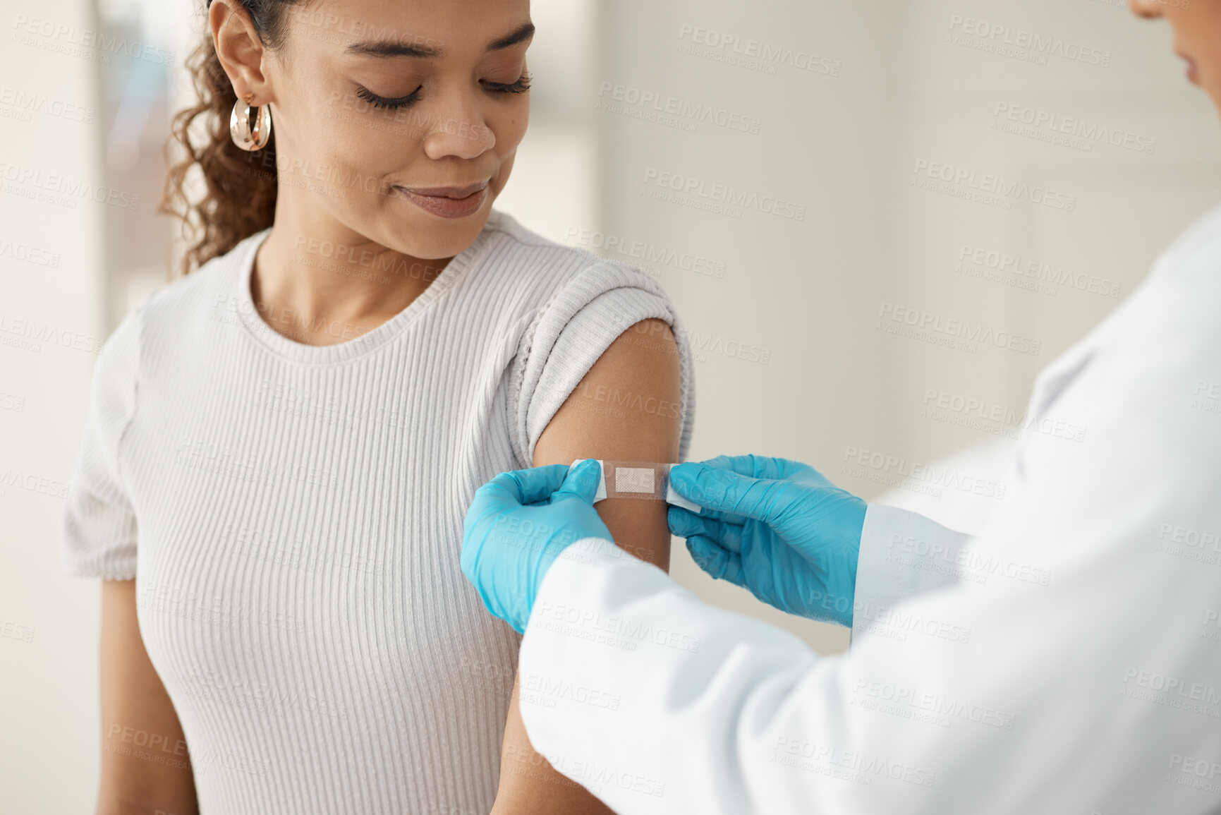 Buy stock photo Vaccine, woman and hands of doctor with plaster for health, wellness and injection in clinic. Healthcare, patient or specialist in hospital for immune system strength, illness prevention or flu shot