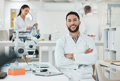 Buy stock photo Research, portrait and man in laboratory with confidence, smile and medical science innovation. Healthcare, happy and scientist at desk with arms crossed, study or pride in pharmaceutical engineering