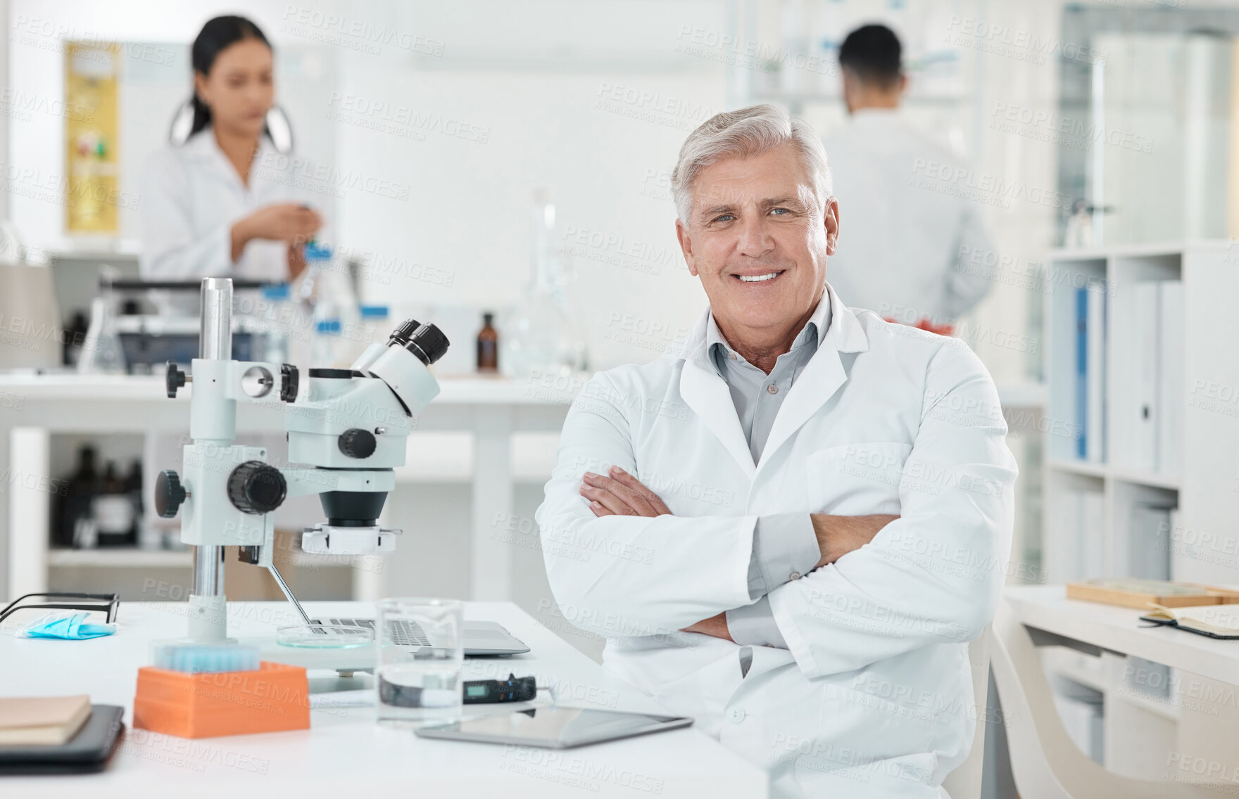 Buy stock photo Laboratory, portrait and mature man with confidence, smile and medical science innovation. Healthcare, happy face and scientist at desk with arms crossed, study or pride in pharmaceutical engineering