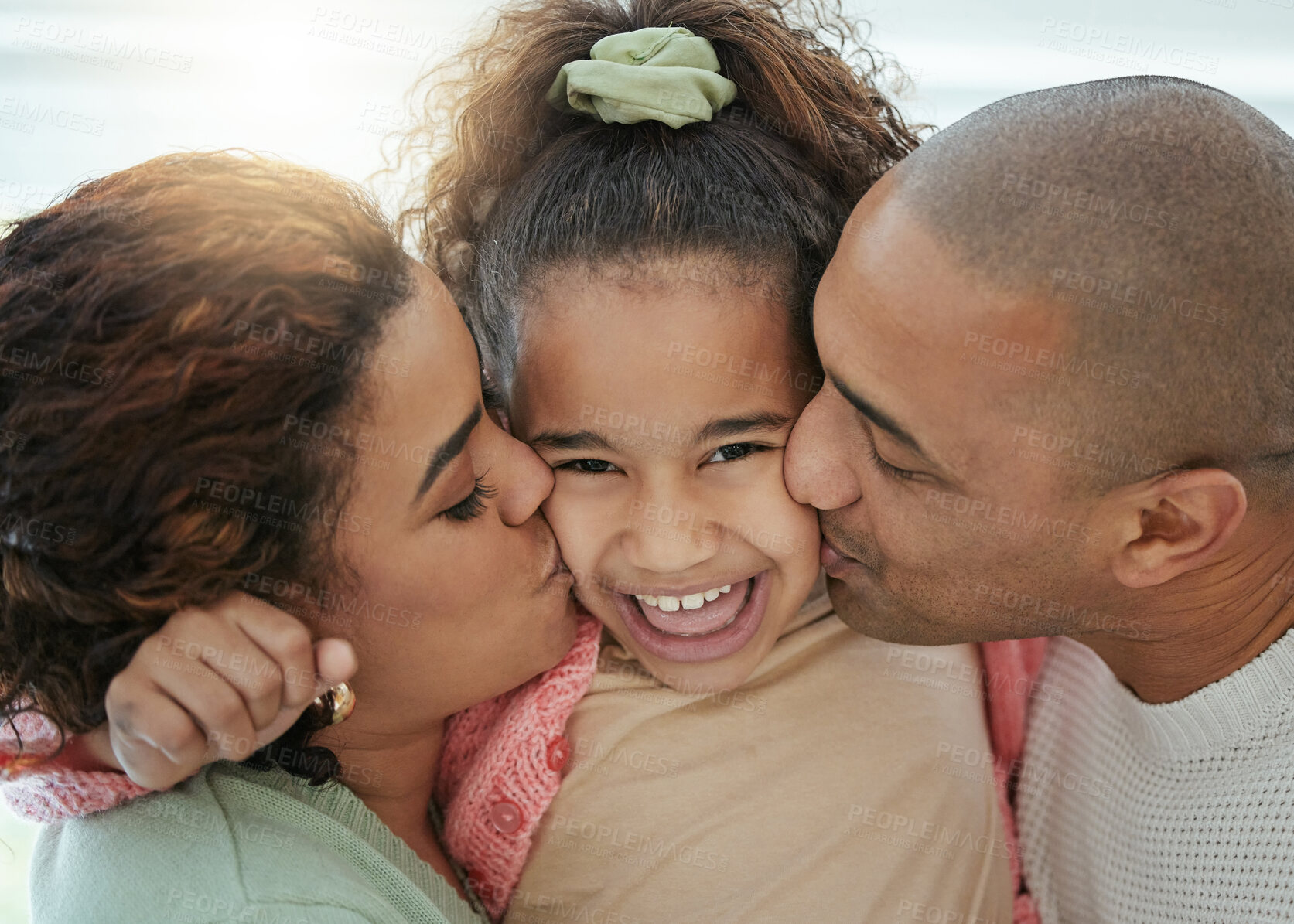 Buy stock photo Family, kiss and portrait in home for laughing, care and support in relationship for happiness. Parents, daughter and relax together for love, embrace and security in living room for child affection