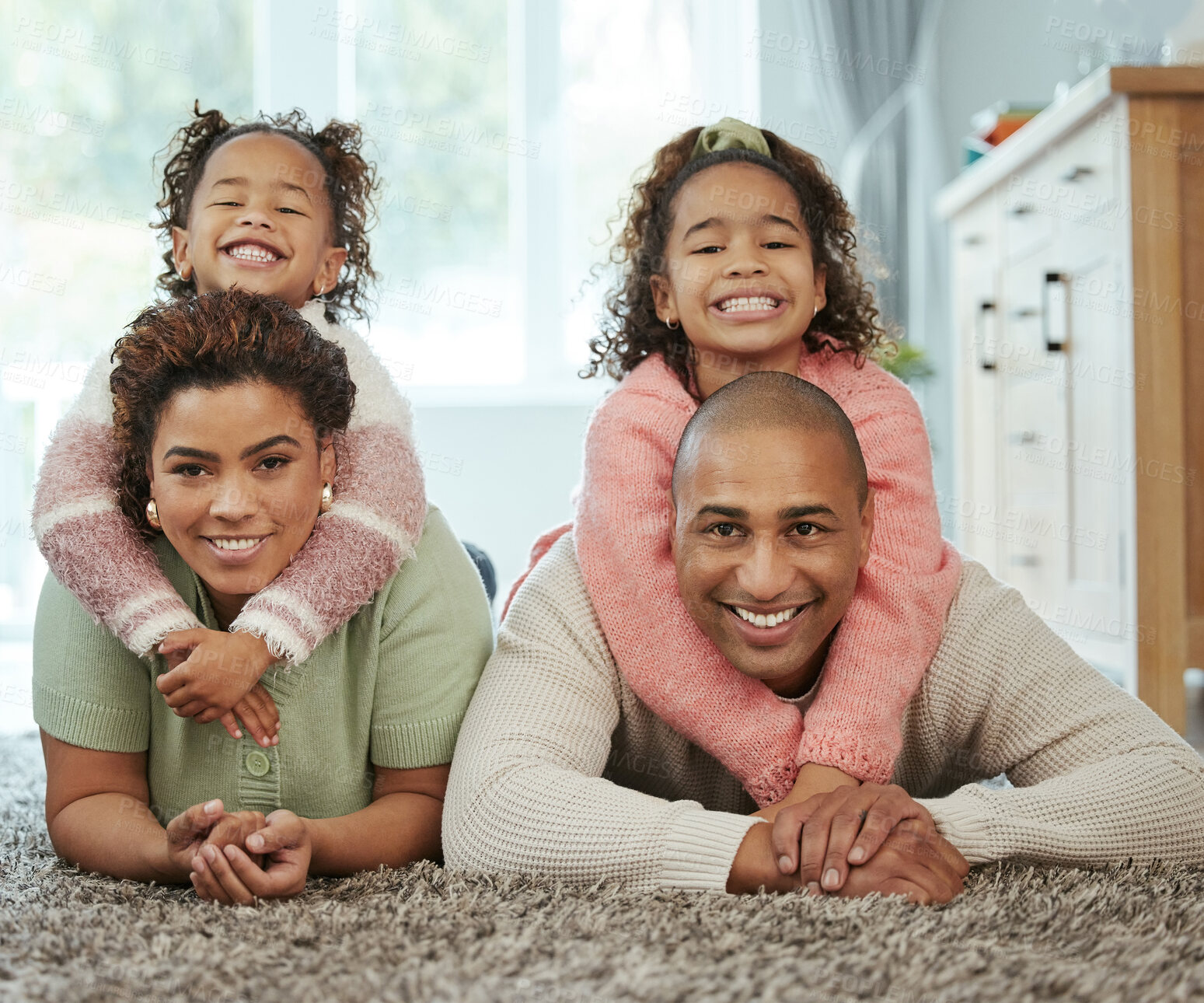 Buy stock photo Family, hug and stack in home portrait, bonding and support in relationship for happiness. Parents, children and relax on floor together for love, embrace and security on carpet for care in lounge