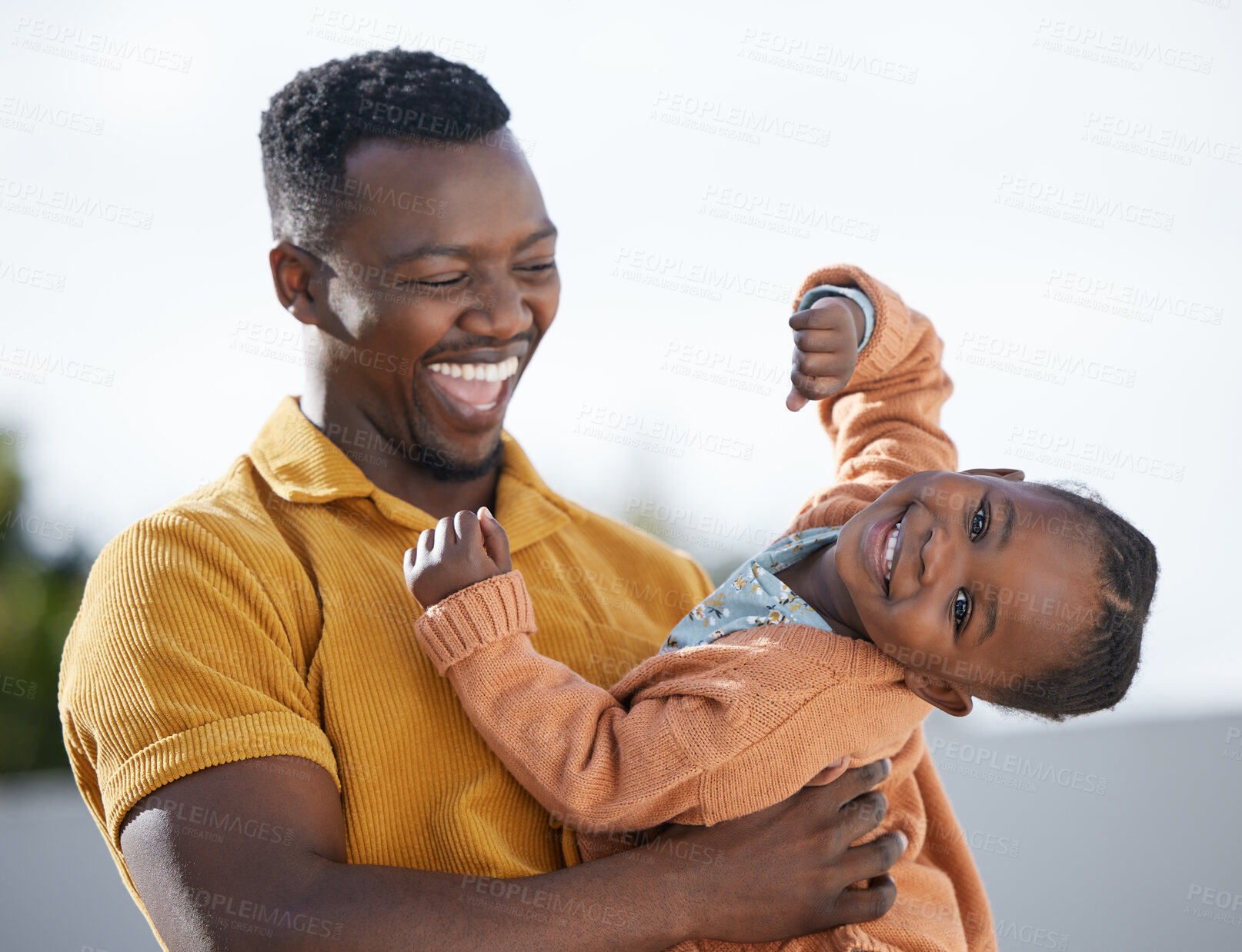 Buy stock photo Black family, kid and portrait of dad laughing outdoor for love, care and bonding together. Face, father and carrying funny girl child for playing game, support and connection at garden with parent