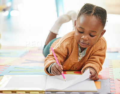 Buy stock photo Shot of a little girl relaxing and drawing