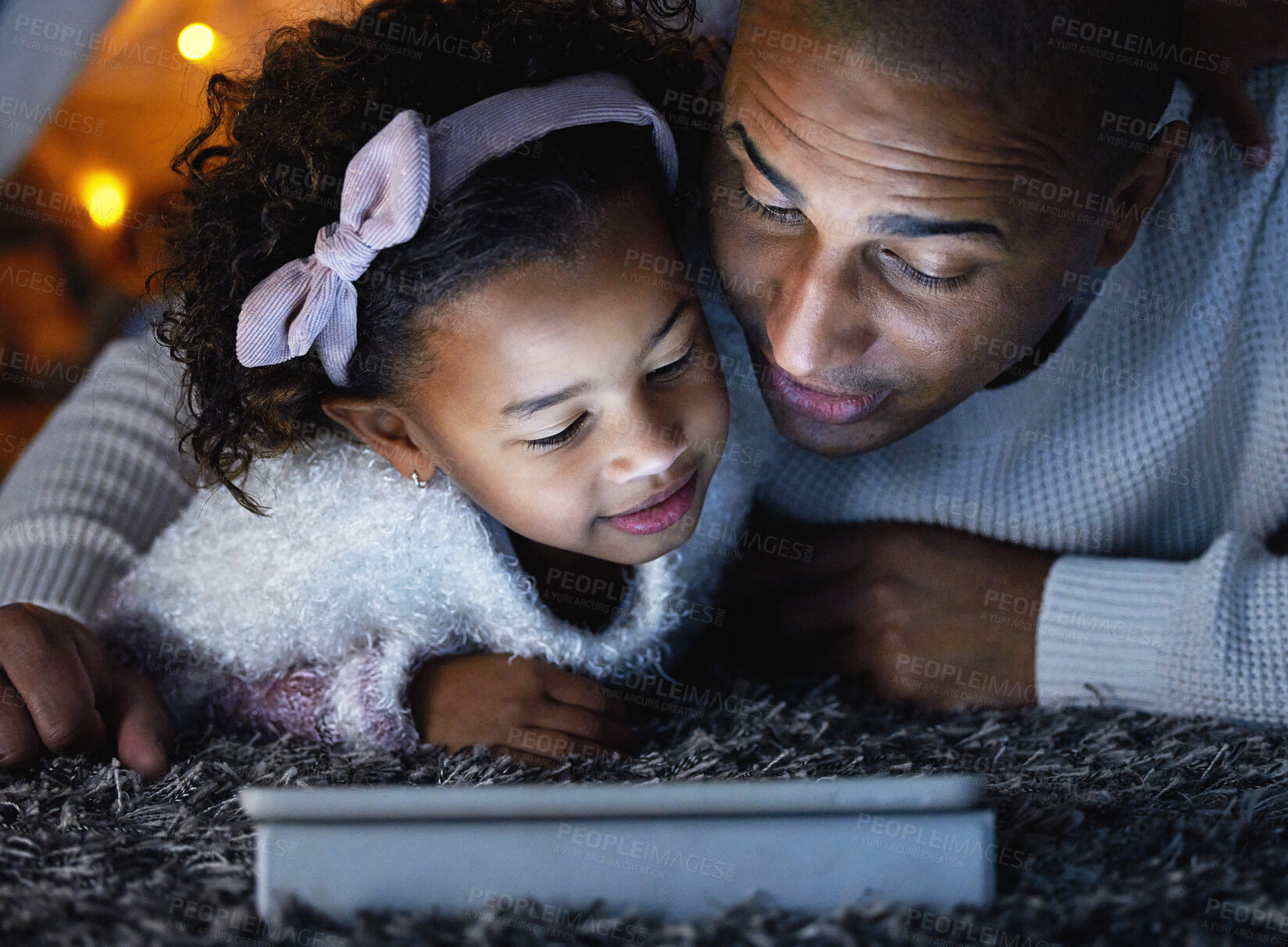 Buy stock photo Dad, tablet and kid relax in home for learning, streaming or reading bedtime story on ebook together. Father, girl or child on technology on floor for education, game or family watch cartoon at night