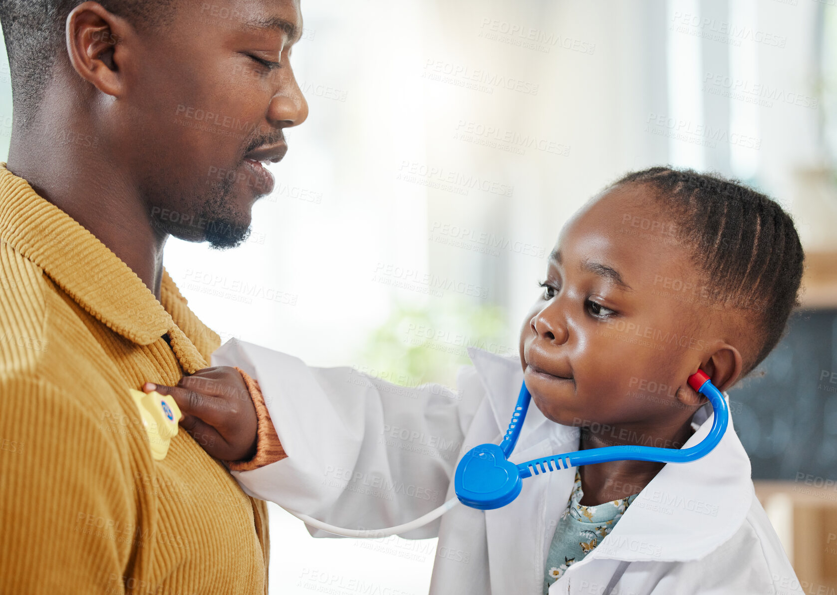 Buy stock photo Father, kid and playing doctor with costume or healthcare toys for bonding, pretend or cardiology at home. Black family, dad and child listening to heart beat for nursing game, checkup or career day