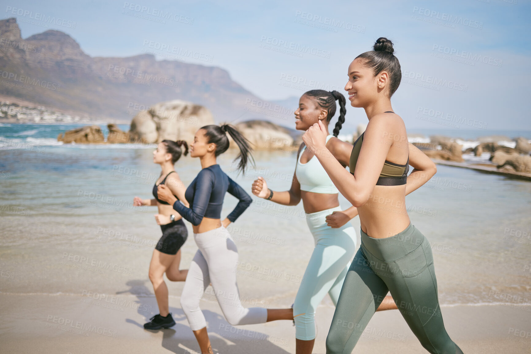 Buy stock photo Sports, running and group of women by beach for workout in morning with exercise community. Health, fitness and female athletes with cardio by ocean or sea for endurance, speed and physical training.