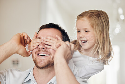 Buy stock photo Shot of a father and daughter playing at home