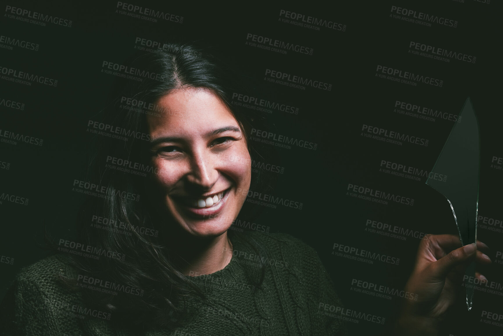 Buy stock photo Portrait, broken mirror and woman with smile, glass and person on dark studio background. Face, model and girl with trauma, creepy or horror with mental health, bipolar and schizophrenia with anxiety