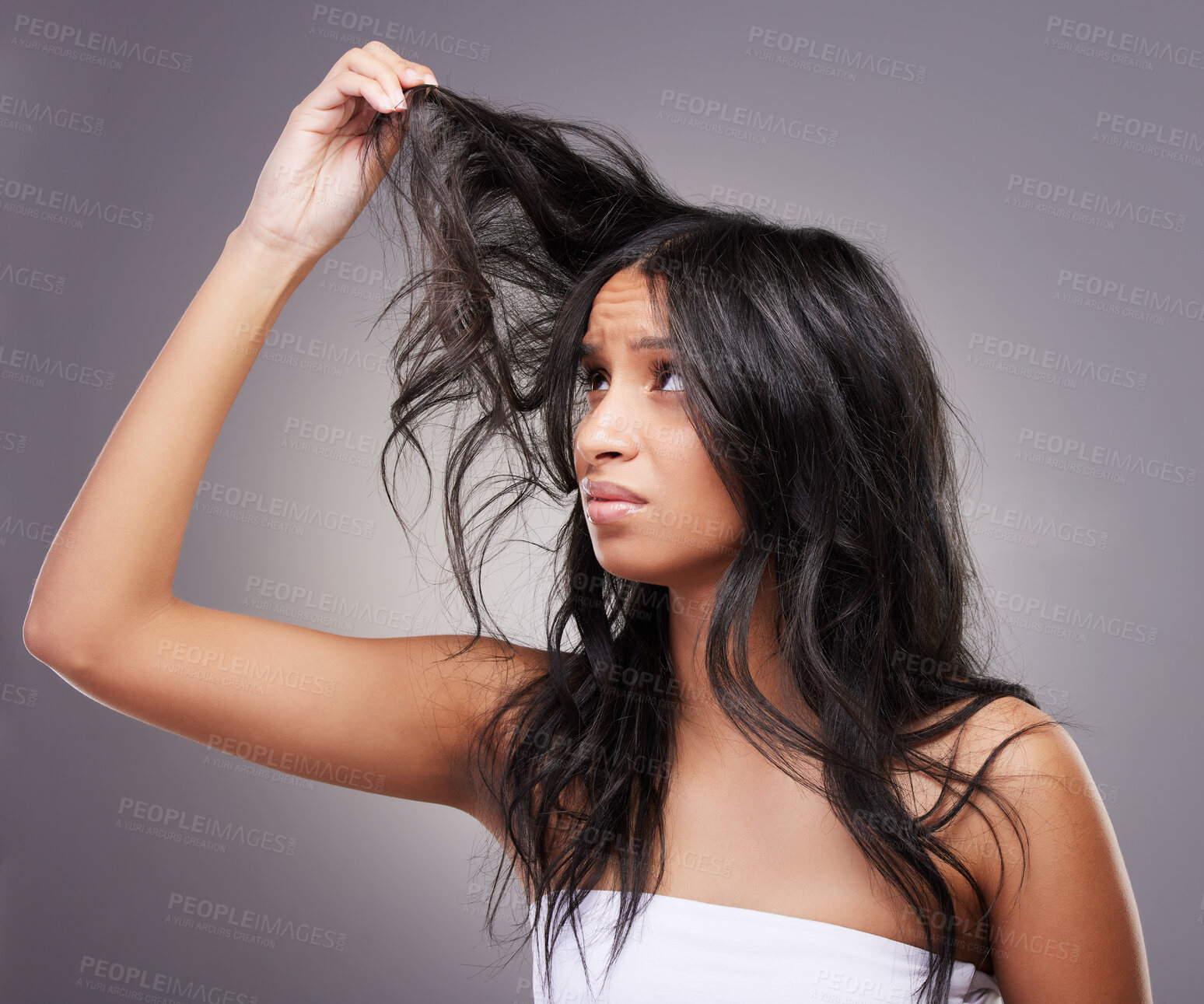 Buy stock photo Frustrated, hair damage and woman with split ends on studio background for haircare, beauty and salon haircut. Girl, head and grooming problem or care, treatment and model with messy hairstyle 