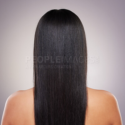 Buy stock photo Woman, back and hair treatment in studio grey background for grooming, wellness and self care. Female person, beauty conditioner or salon shine for fresh, keratin glow and relaxer routine with volume