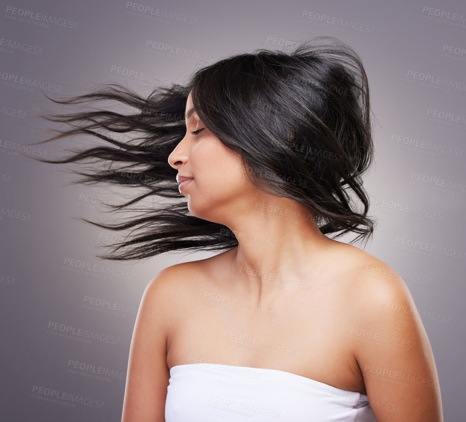 Buy stock photo Beauty, hair flip and woman with healthy scalp for shine results, growth and salon grooming for care in studio. Texture, model girl and hairstyle motion with luxury spa aesthetic by grey background