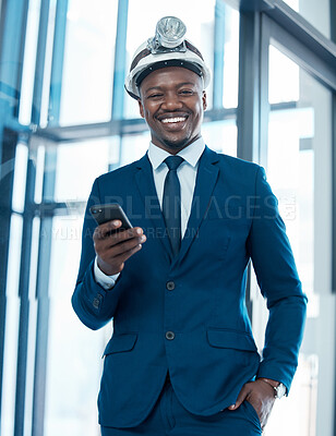 Buy stock photo Portrait, businessman on cellphone and construction hat for project, development and networking in office. Technology, planning and happy architect in workplace with internet for online communication