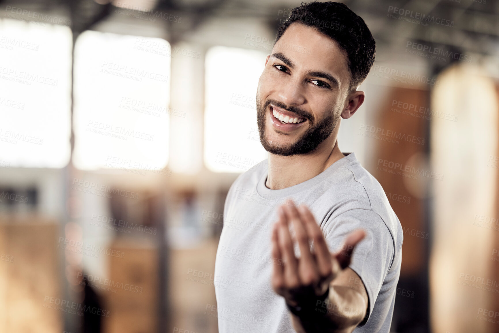 Buy stock photo Shot of a young man in a gym