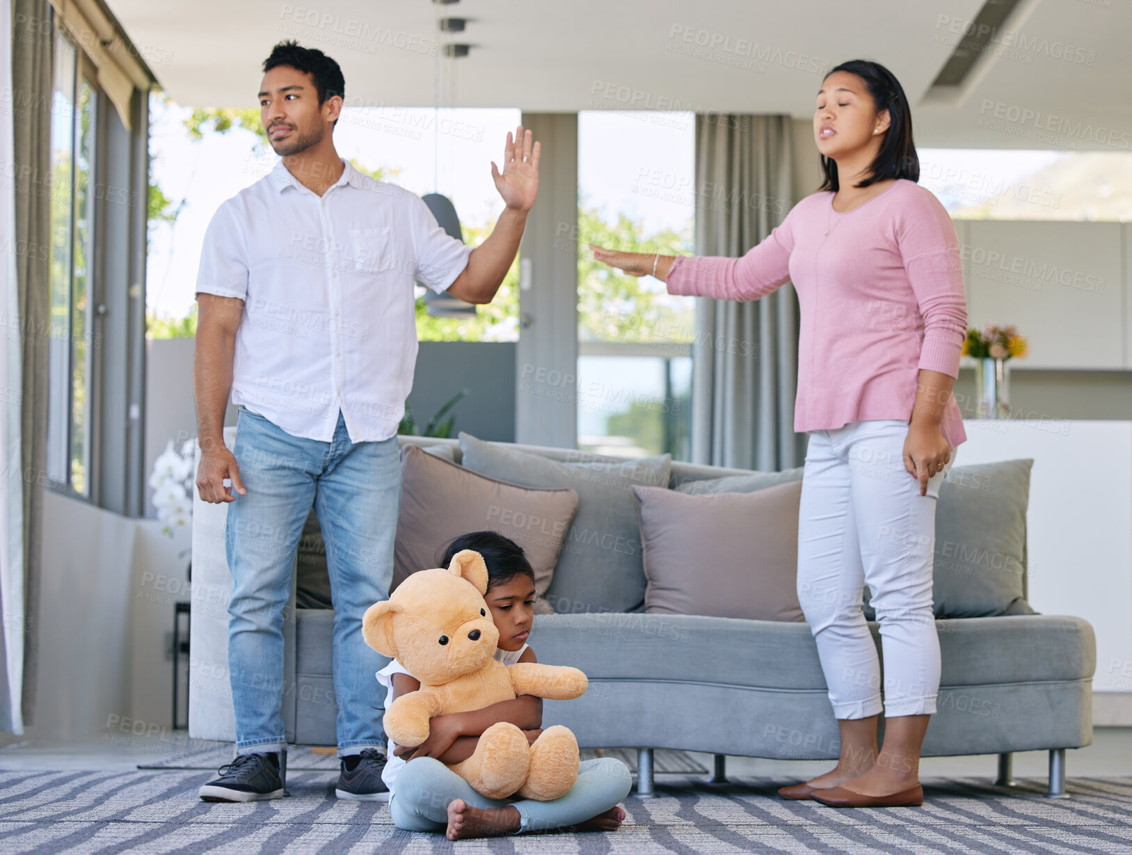 Buy stock photo Parents, fighting and sad child in home, living room and girl with teddy bear for support and comfort in family conflict. Couple, divorce and marriage problems, kid and anxiety for disagreement