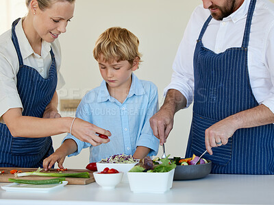 Buy stock photo Kitchen, parents and teaching son, cooking and bowls with nutrition of vegetables, counter or table. Home, learning and boy with support of family, love and help with salad for sandwich and lunch