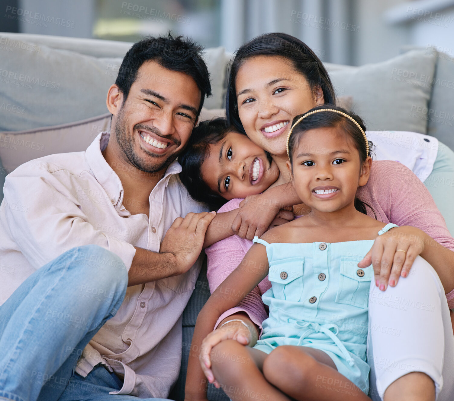Buy stock photo Smile, relax and portrait of Asian family by sofa for love, child development and support at home. Happy, man and woman with children in living room for weekend, bonding and affection on mothers day