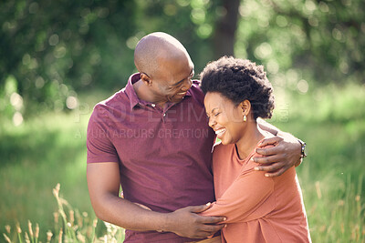 Buy stock photo Shot of an affectionate couple spending time together outdoors