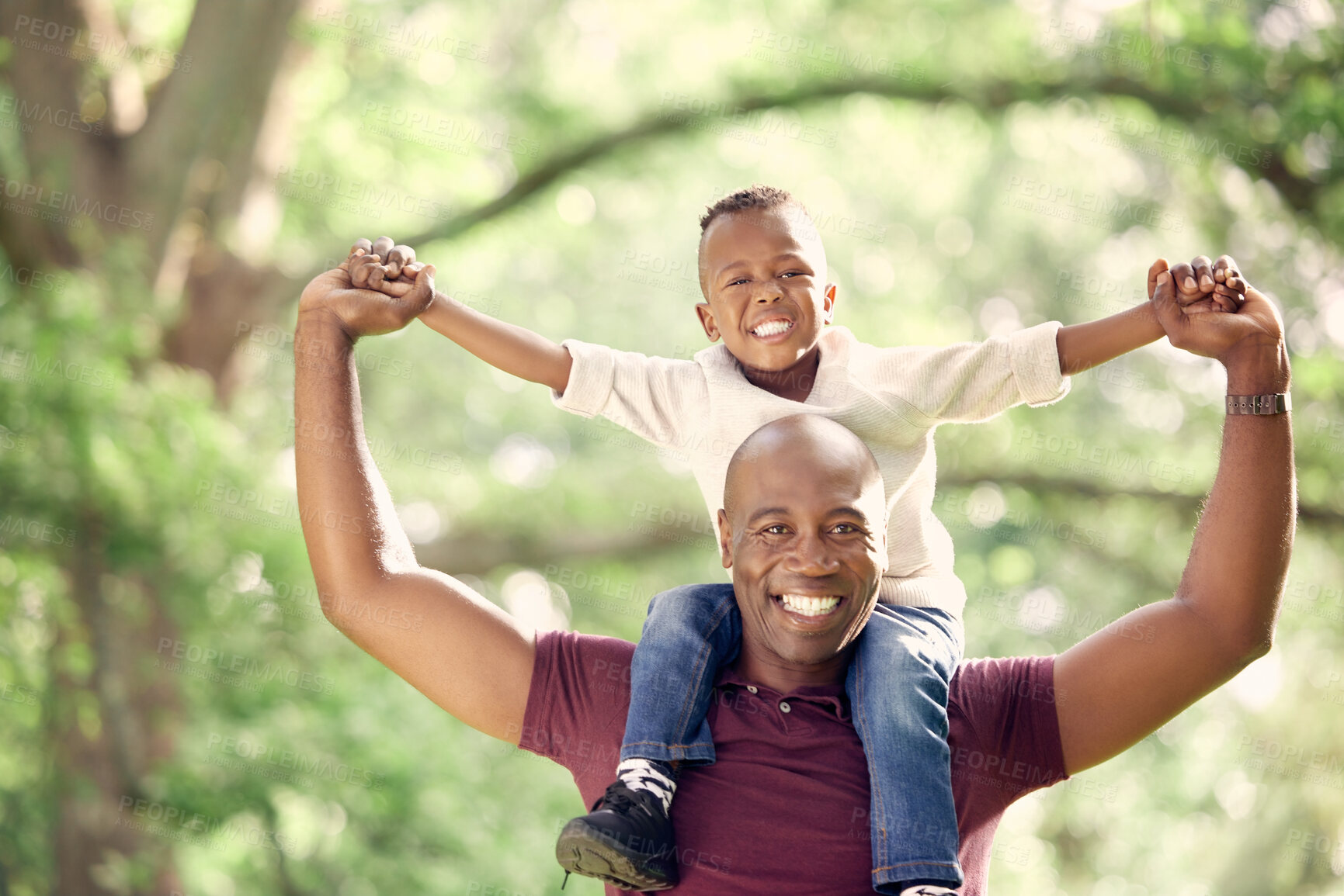 Buy stock photo Shot of a man spending the day outdoors with his son