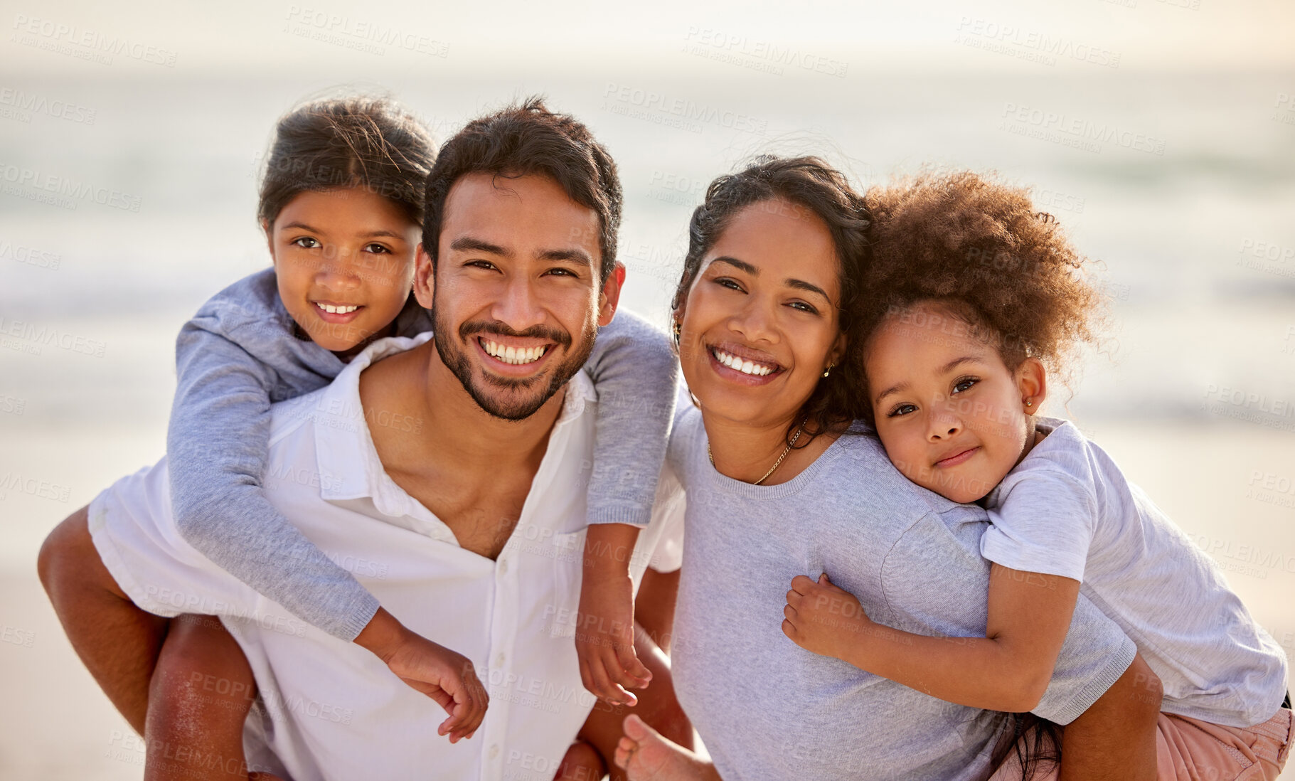 Buy stock photo Vacation, beach and portrait of parents with children excited for holiday together at the sea or ocean in summer. Love, father and mother smile with kids relax, care and travel for an adventure