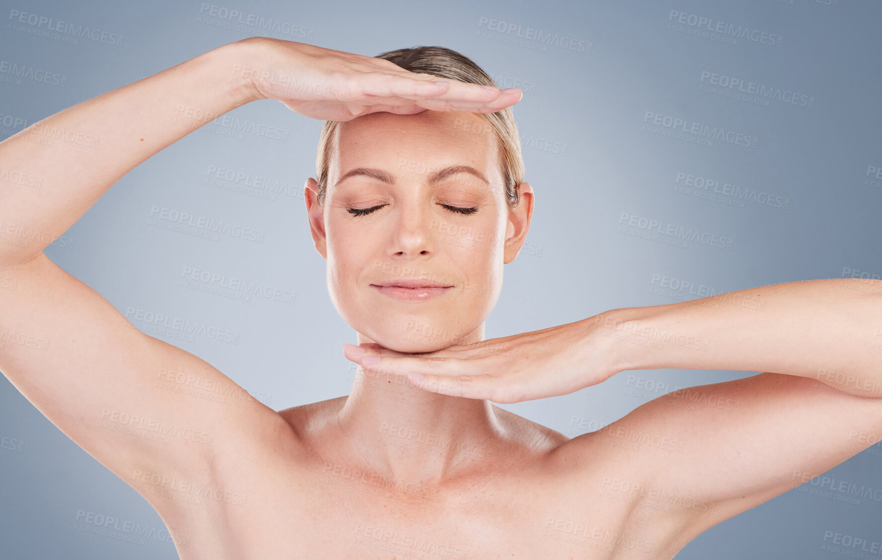 Buy stock photo Skincare, woman and hands to frame face on studio background for dermatology or beauty. Facial, treatment and model gesture with antiaging cosmetics for healthy glow on skin, texture and aesthetic