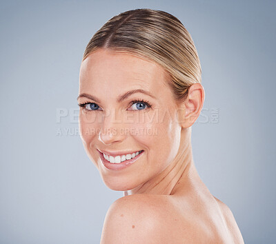 Buy stock photo Beauty, skincare and portrait of woman in studio for facial, cosmetics and natural makeup. Self care, wellness and mockup with face of female model on grey background for glow, happiness and collagen
