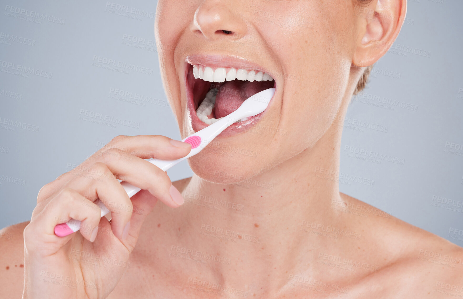 Buy stock photo Woman, mouth and brushing teeth in studio with toothbrush, oral hygiene for self care. Gum health, whitening and cleaning plaque for dental wellness, dentist approved product and fresh breath