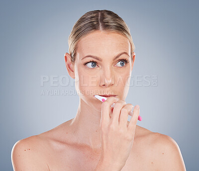 Buy stock photo Woman, studio and toothbrush for brushing teeth, dental health and cleaning mouth for wellness. Hygiene, fresh breath and self care with mockup on background, dentist approved and thinking model
