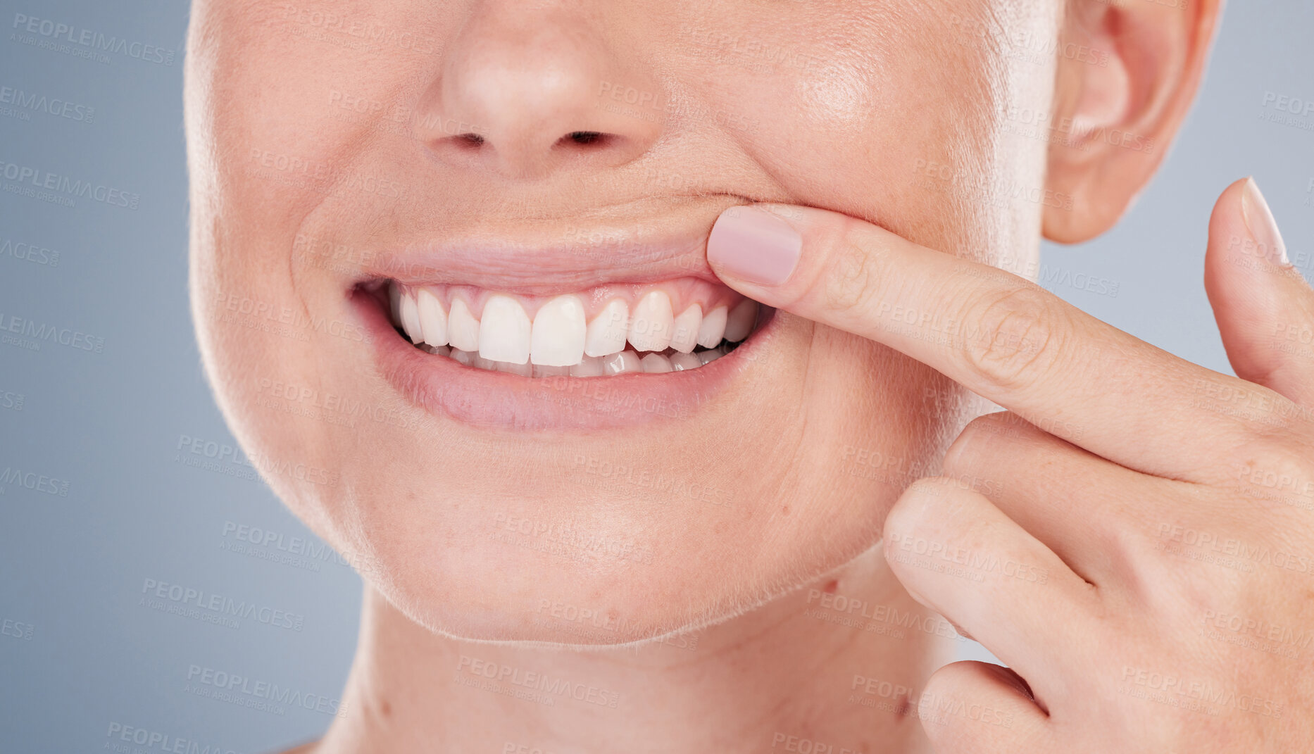 Buy stock photo Smile, closeup and hand on teeth at dentist in studio background and woman with healthy gums. Person, mouth and grooming routine for mouth hygiene and healthcare to prevent gingivitis or tooth decay