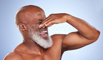 Buy stock photo Disgusted, African man and holding nose in studio for body odour and bad or dirty smell. Mature, stink and male person by backdrop for unpleasant, gross and unhappy emoji for bowel problem or fart