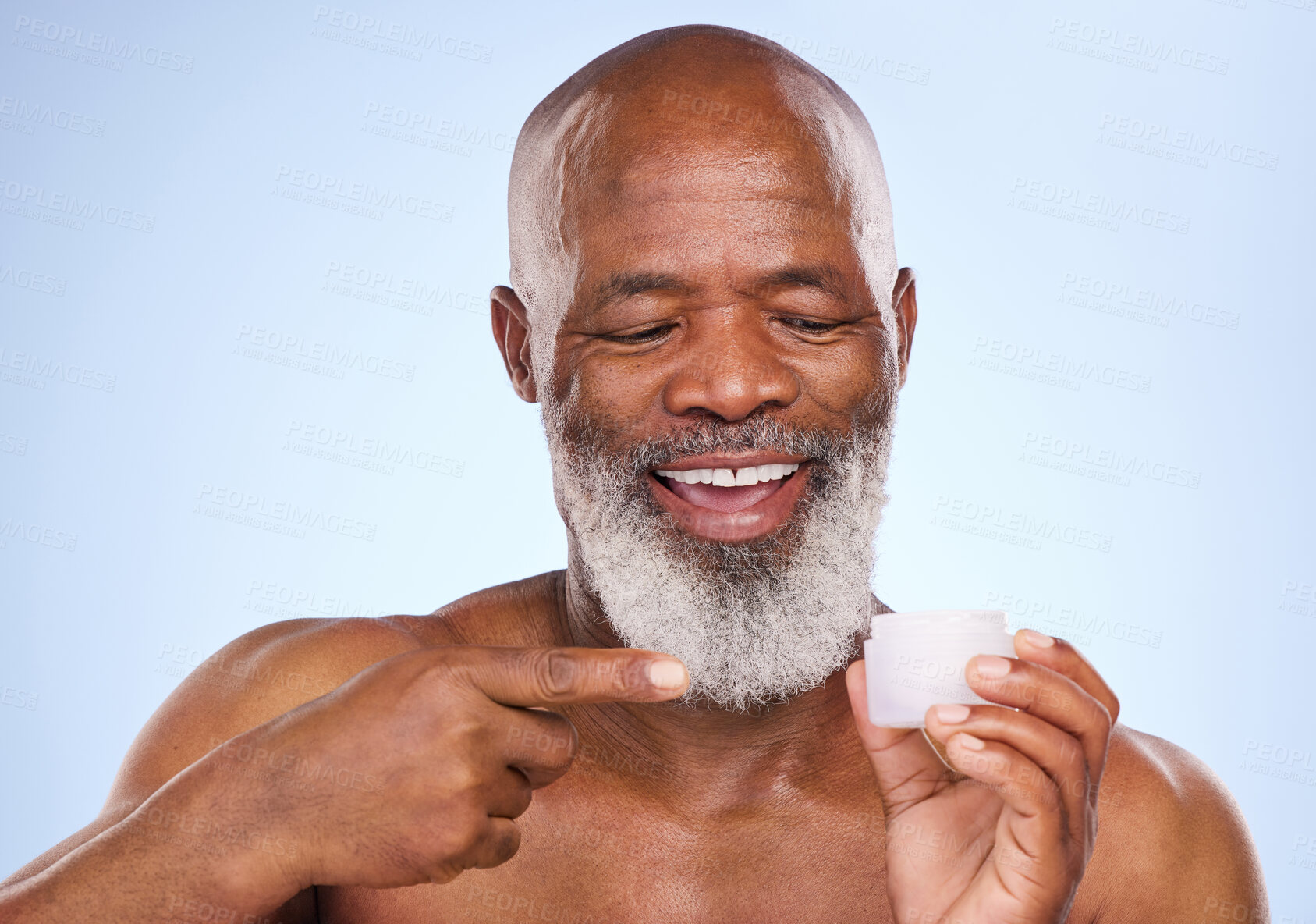 Buy stock photo Lotion, product and skincare with mature black man in studio on blue background for hydration or moisture. Beauty, cosmetics or cream and face of happy model with container for antiaging wellness