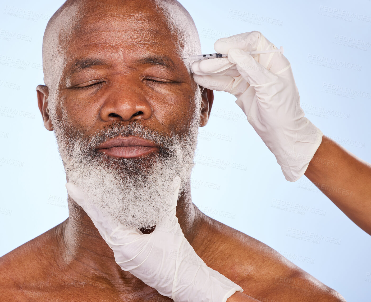 Buy stock photo Injection, beauty and black man in studio with cosmetic, medical and facial procedure with syringe. Hands, needle and mature African male person with face anti aging filler shot by white background.