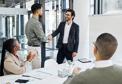 Buy stock photo Shot of a group of businesspeople having a meeting in an office at work