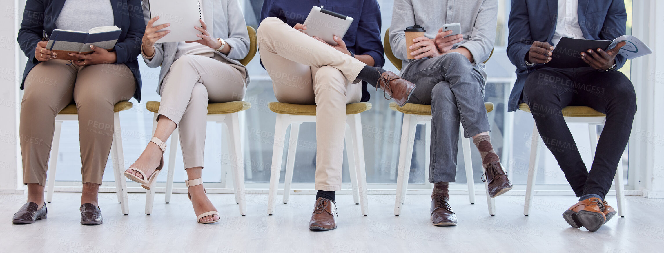 Buy stock photo Recruitment, people and queue in waiting room for job interview, hiring or legs on chair in line. Group, lobby or scroll phone or tech in human resource office with resume, info and opportunity