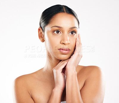 Buy stock photo Cosmetics, woman and thinking in studio for dermatology, skincare and glow or shine by white background. Beauty, makeup and idea for wellness, collagen and benefits for results with facial and luxury