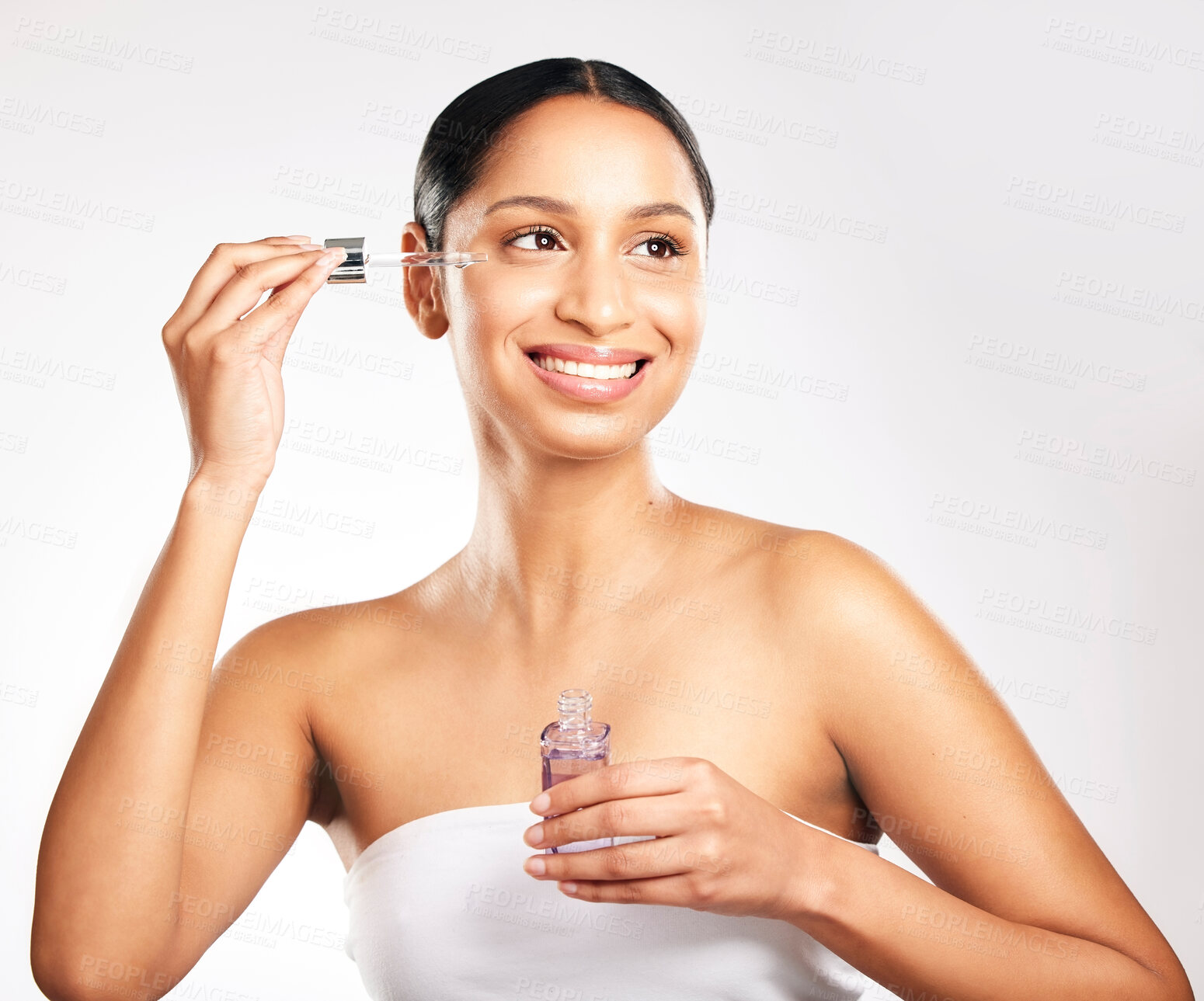 Buy stock photo Woman, smile and skincare serum with pipette or treatment for anti aging, hydration or hyaluronic acid. Female person, thinking and beauty product on white background in studio, liquid or retinol