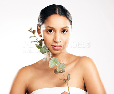 Buy stock photo Woman, portrait and plant for natural beauty, skincare or nature cosmetics against a white studio background. Face of female person or model with green leaf, leaves or dermatology for sustainability