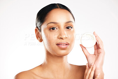 Buy stock photo Woman, portrait and face cream for skincare, beauty or cosmetics against a white studio background. Female person with container product, lotion or skin creme for dermatology or facial treatment