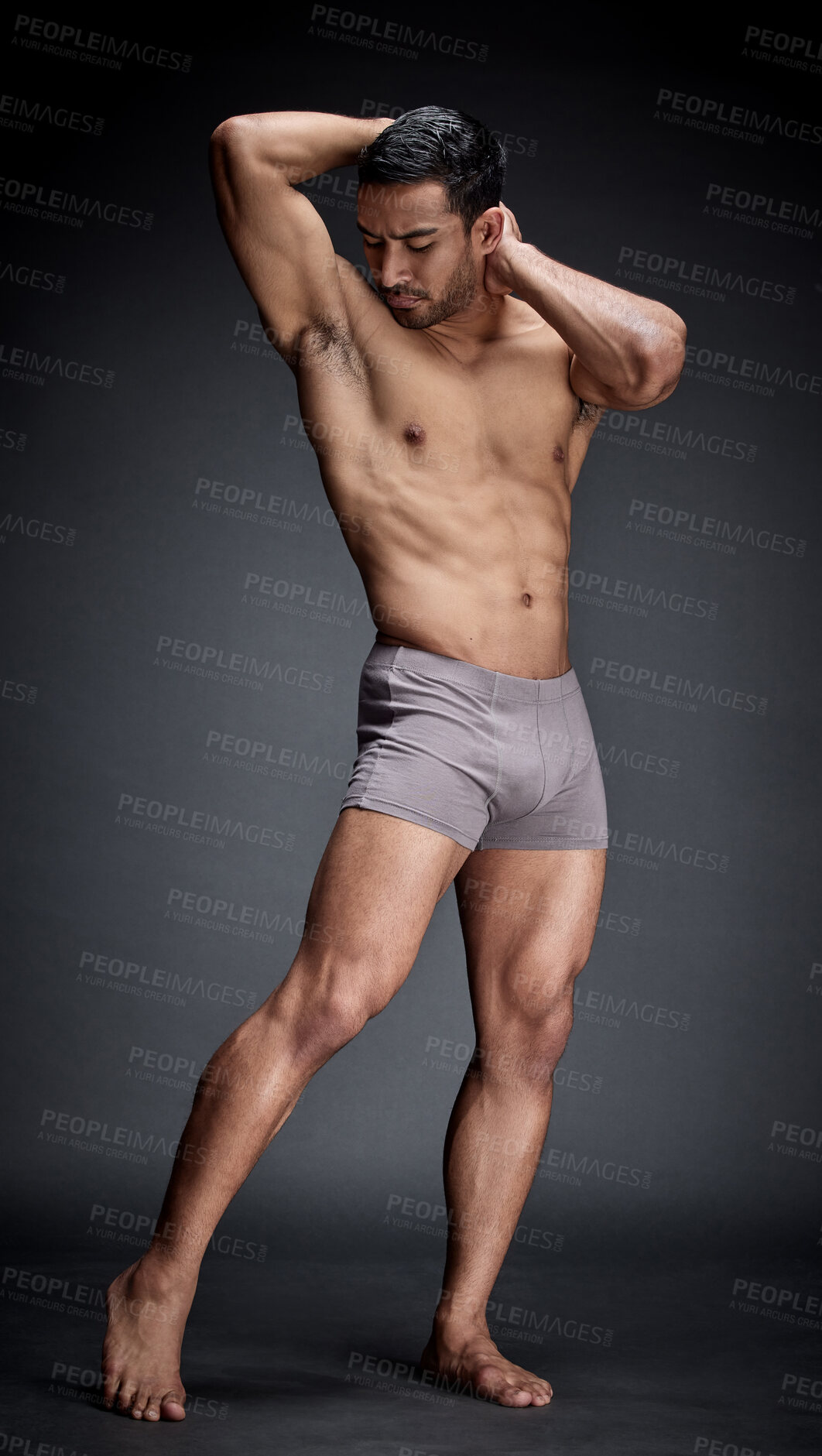 Buy stock photo Fitness, asian man and bodybuilder in underwear flexing abs and strong body for calisthenic exercise in studio. Sexy, male person and confidence with stomach muscles from training and workout goal