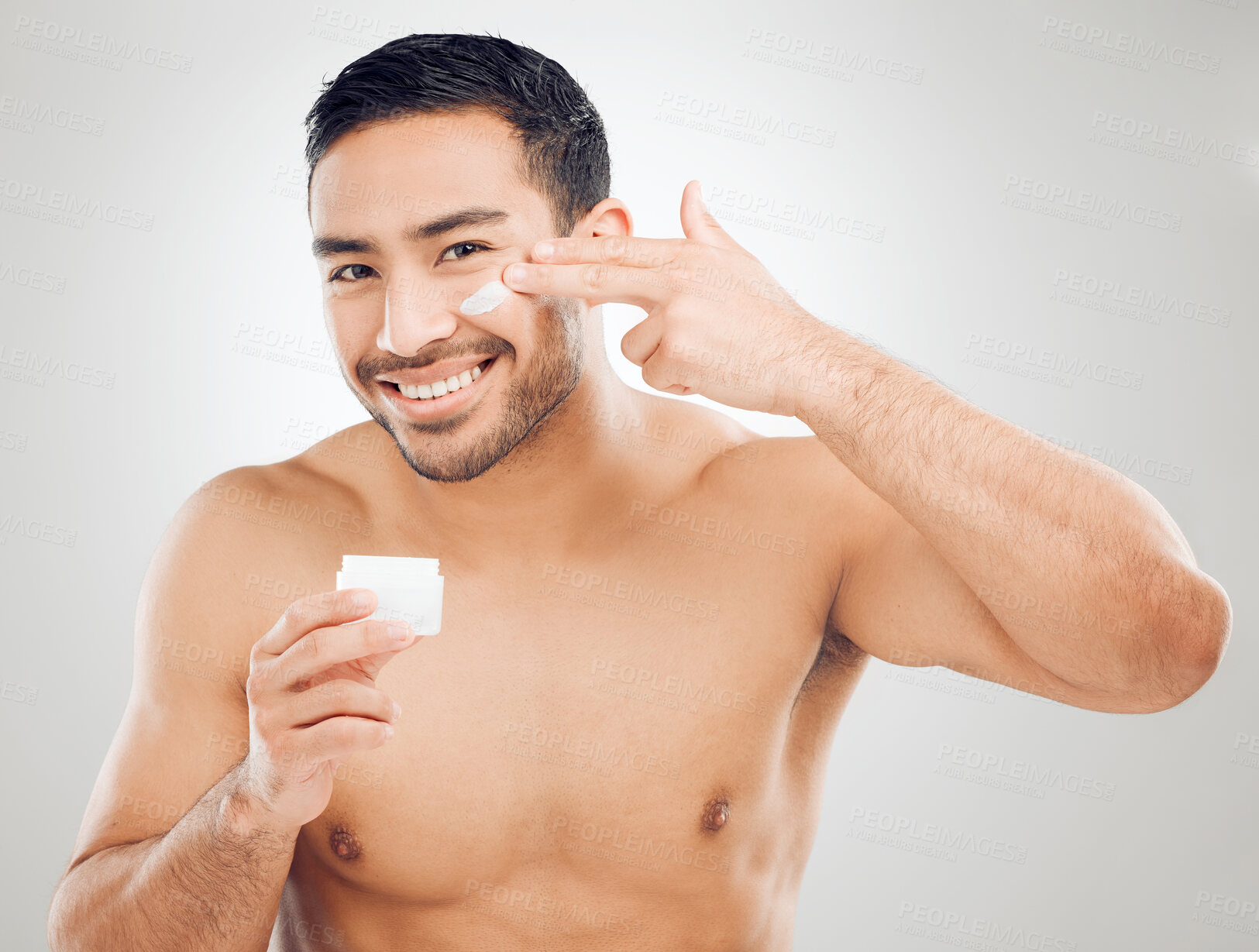 Buy stock photo Jar, skincare portrait and man with face cream for beauty glow and self care for healthy shine in studio. Model guy, dermatology and sunscreen container with anti aging benefits by white background