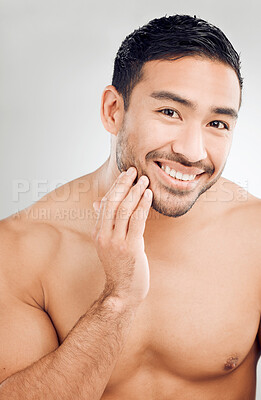 Buy stock photo Skincare, hand and man portrait in studio for morning routine, wellness or natural treatment on white background. Grooming, body and model with smile for confidence, facial hygiene or satisfaction