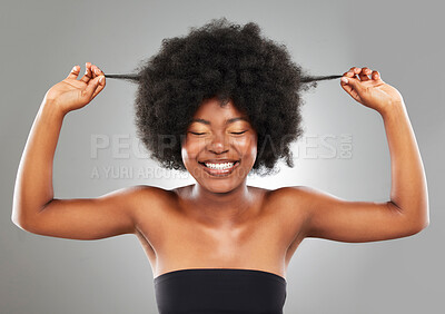 Buy stock photo Happy, afro and black woman with eyes closed, length and healthy growth for treatment or hairstyle. Female person, wellness and volume with texture, cosmetics for natural aesthetic on gray background