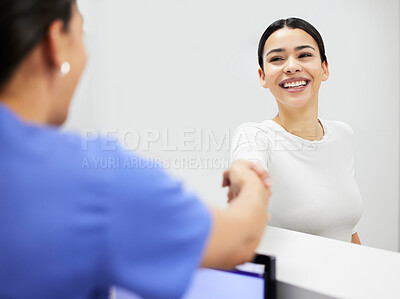 Buy stock photo Handshake, nurse and woman at clinic reception, healthcare service and talking, questions or health consultation. Consulting, welcome and doctor or people at help desk for insurance survey or advice