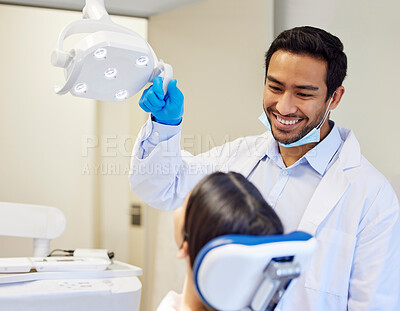 Buy stock photo Dentist, man and patient in chair for dental service, healthcare exam or medical insurance in consultation office. Happy asian person or doctor for woman teeth whitening, oral or cleaning in clinic